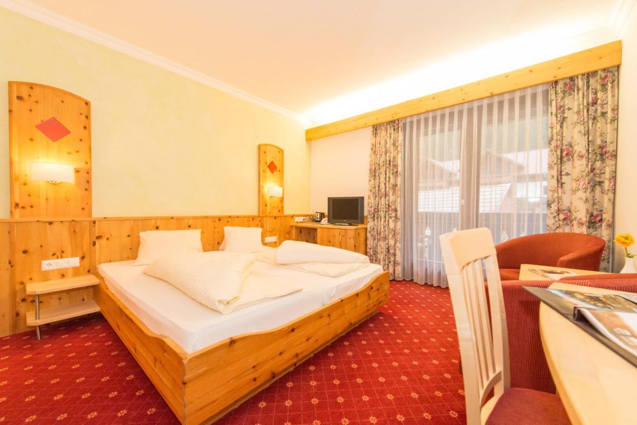 Lacus Hotel Am See Weissensee Extérieur photo